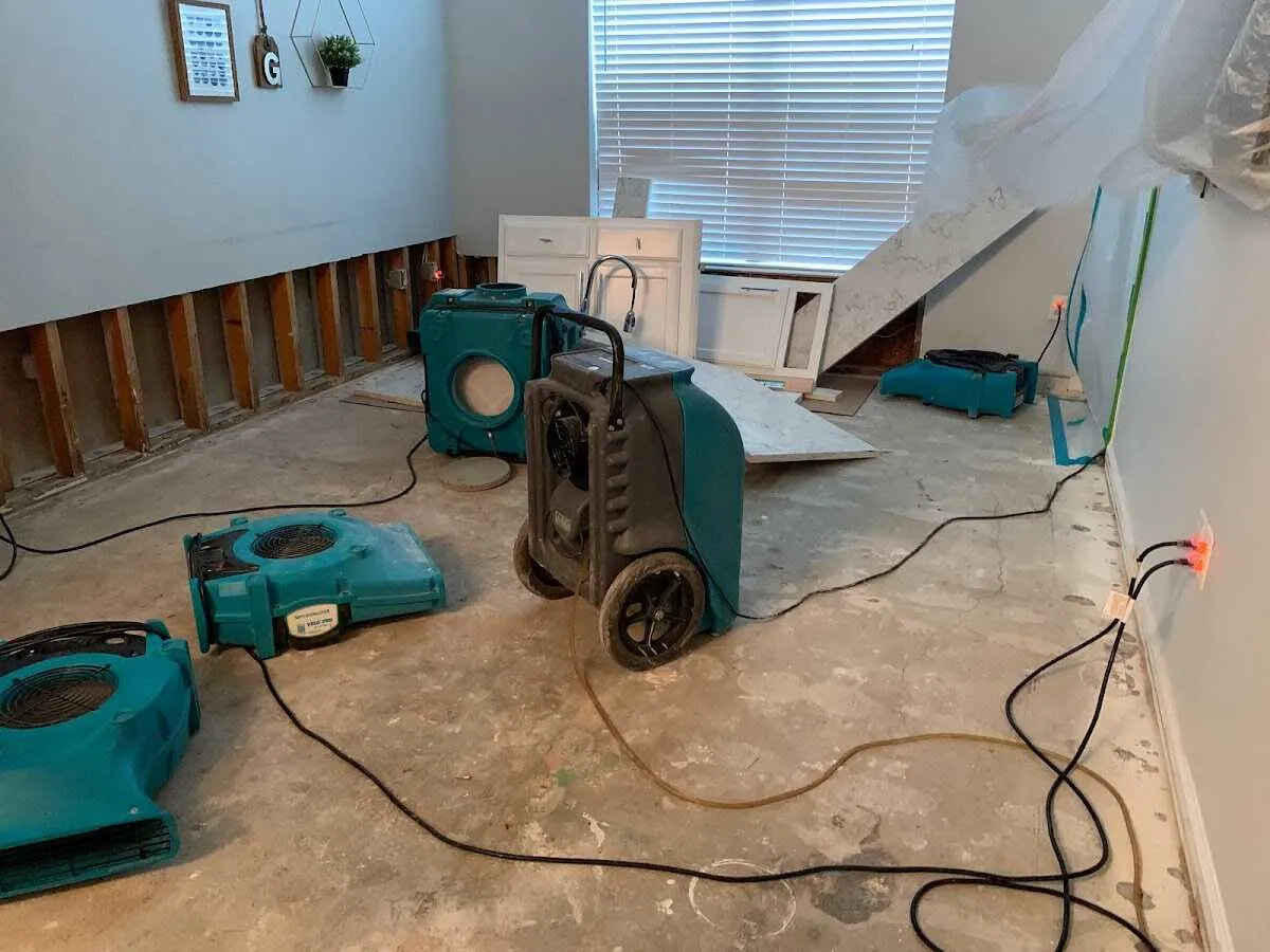 Dehumidifier in flood-cut room for Water Damage Restoration in Northwood